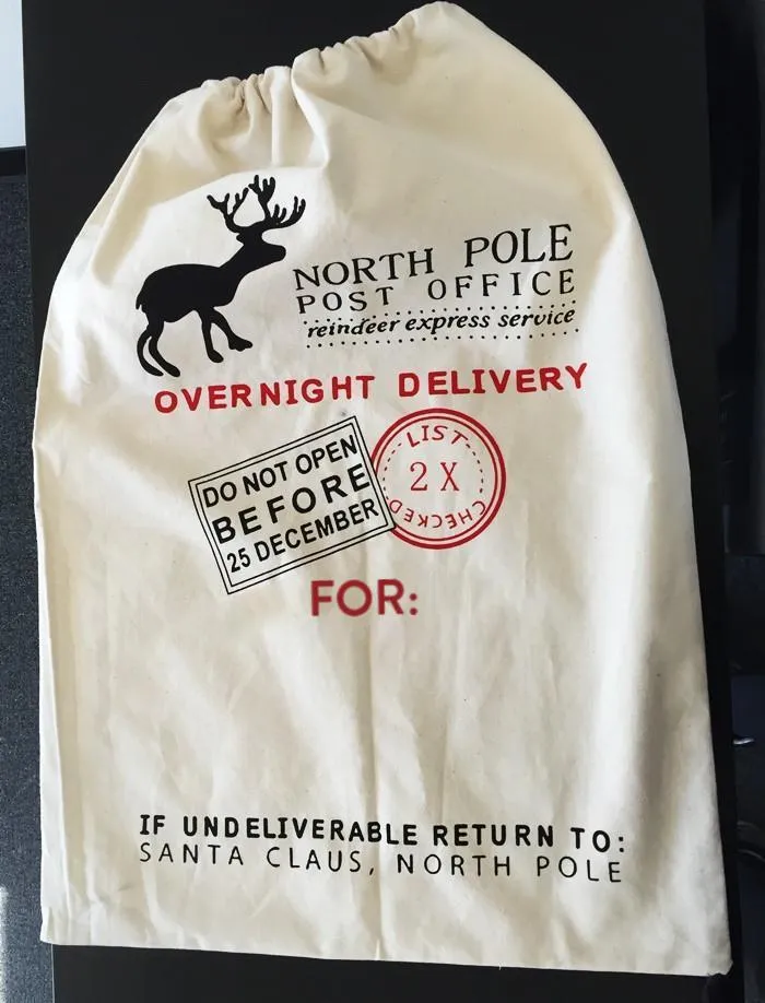 12 ct Printed North Pole Canvas Santa Sacks - By Dozen