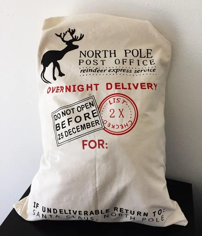 12 ct Printed North Pole Canvas Santa Sacks - By Dozen