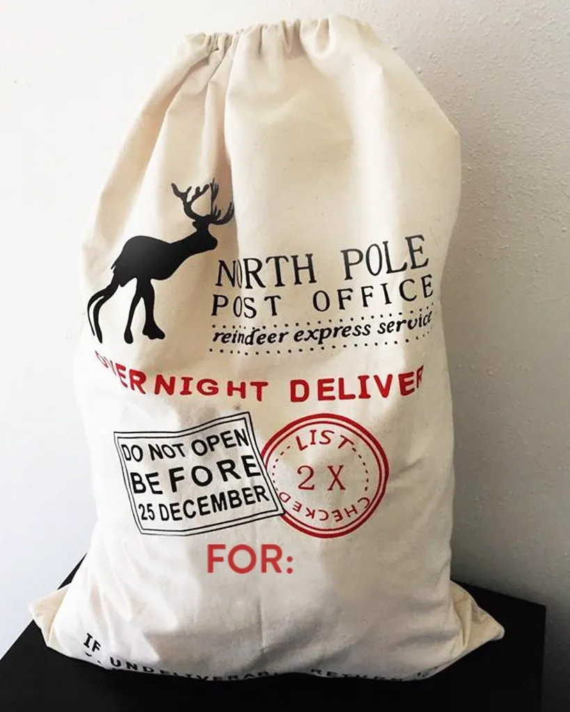 12 ct Printed North Pole Canvas Santa Sacks - By Dozen